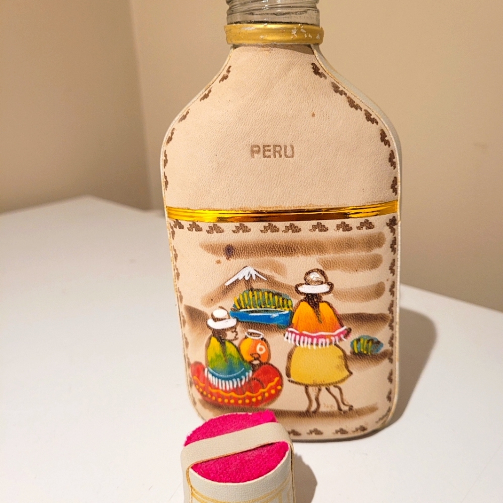 Hand crafted leather Peruvian whiskey decanter.